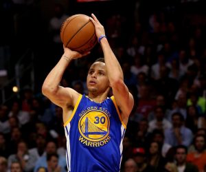 NBA Player comforts young boy by praying with him